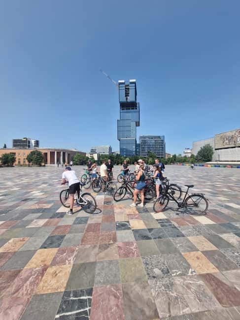 Bike Tour Tirana Highlights - Postbllok checkpoint art: seeing a darker chapter without making it heavy