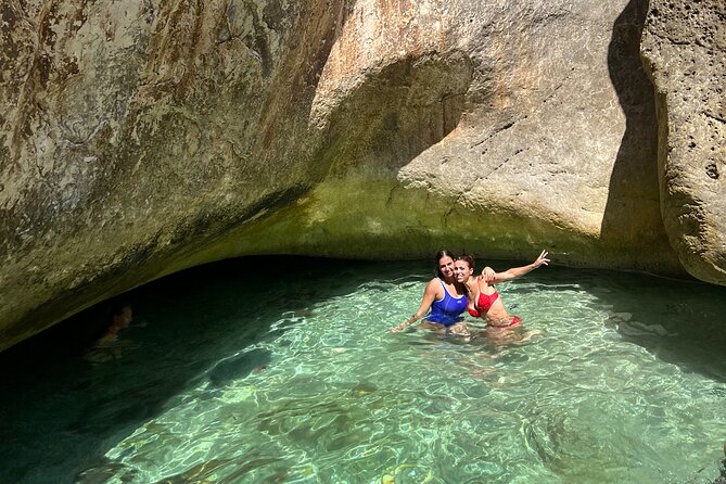 Blue Cave & Grama Bay Full Day Guided Boat Tour - Stop 6 and 7: Plazhi i Llovizit and the Blue Cave Beach Hour