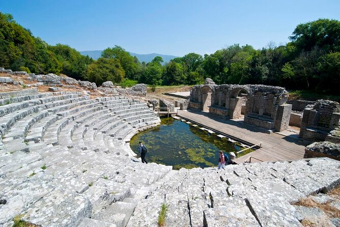 Butrint Ancient City Blue Eye Spring and Lekursi Castle Tour - Lekuresi Castle at golden hour: stone towers and a wide view over Corfu