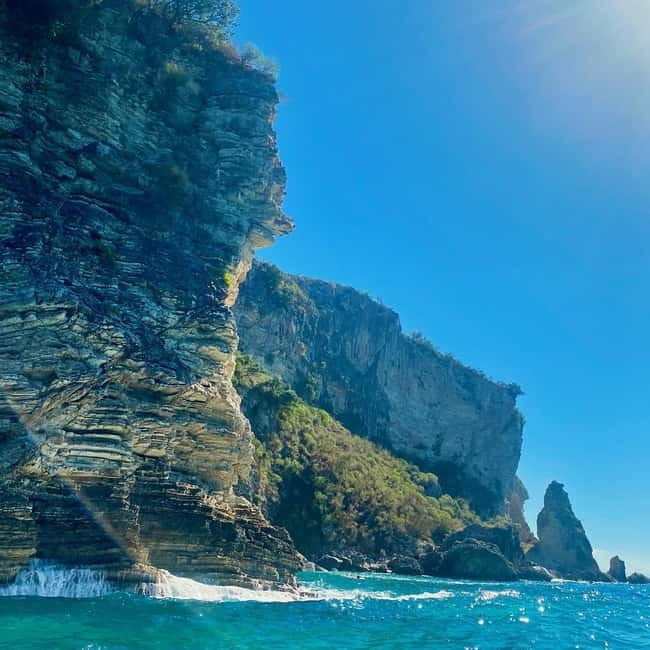 Caves of Porto Palermo: Kayak/SUP Tour with Castle Sea View - Swim and snorkel stop two: another quiet cove with different water color