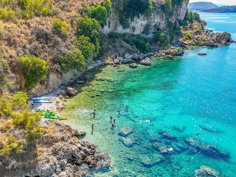 Caves of Porto Palermo: Kayak/SUP Tour with Castle Sea View - Meeting at the castle beach, getting set up, and starting easy