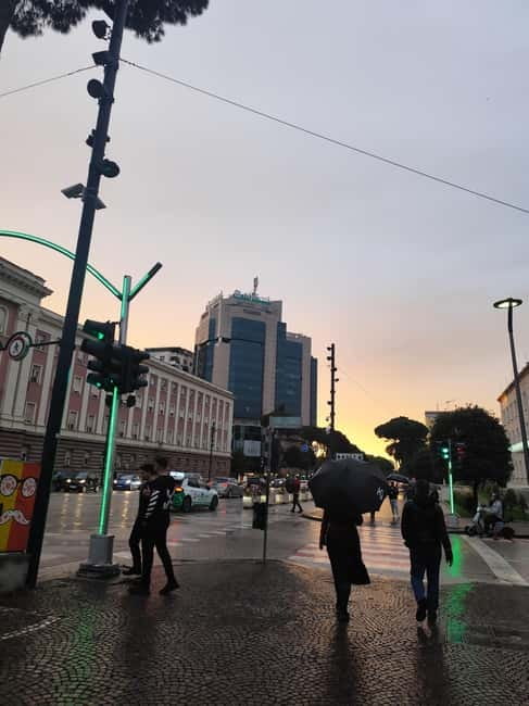 Discover Tirana: Panoramic Tour and Walk around the Artificial Lake - Skanderbeg Square: Et’hem Bey Mosque, clock tower, and the city’s loud center