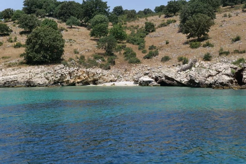 From Saranda, Boat tour to Krorëza,Kakome, and Turtle Cave. - Stop 1: Plazhi i Ushtarit (Soldiers’ Bay) for Photos and a Quick Swim