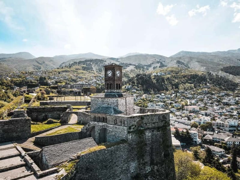 From Tirana: Full-Day Trip to the UNESCO-Listed Gjirokastra - Why Gjirokaster feels like a fortified Stone City, not a museum town