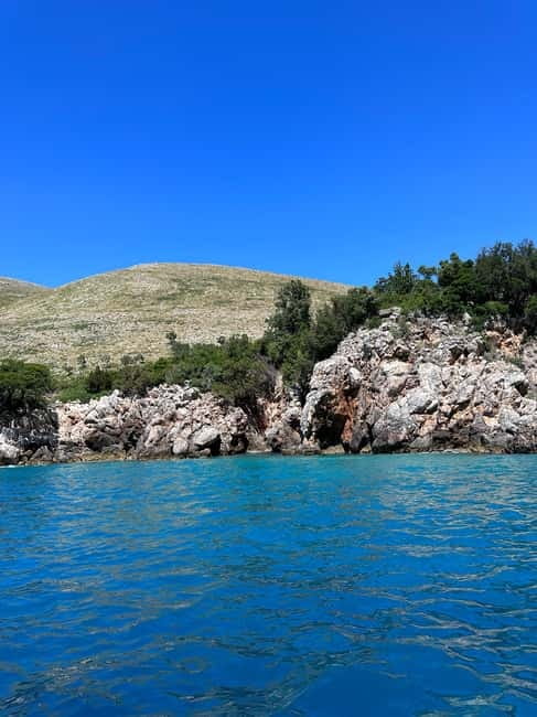 From Vlore: Haxhi Ali Cave Speedboat Tour with Snorkeling - Haxhi Ali Cave: Entering, Exploring, and Snorkeling in Sunlit Water