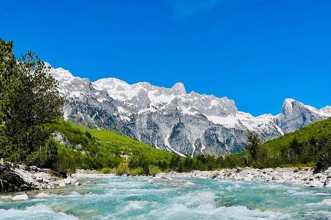 Full Day Tour to Albanian Alps Theth, Grunas Waterfall, Blue Eye - Nderlysaj natural baths: the mountain reset stop