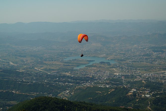 Paragliding Tandem Experience From Dajti Mountain - After You Land: Field Touchdown, Taxi Back, and the End-of-Run Logistics