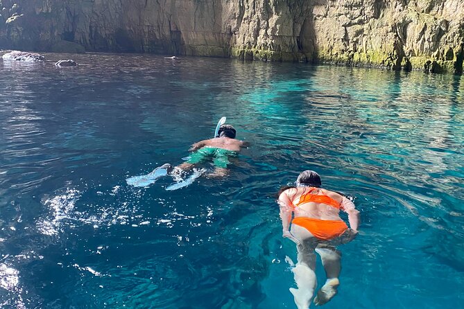 Private Full Day Boat Expedition to Grama Bay - Stop 4: Llovizi Bay and the blue Hidden Seal Monk Cave