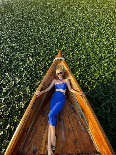 Private Skadar lake tour with guide, snacks and drinks - The wooden boat channel ride: where the plants and quiet show up