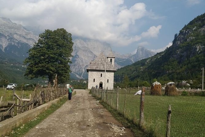 Semi - Private Hiking Tour of Theth & Blue Eye in 2 Days - Theth National Park time: church, the Lock-in Tower, and an overnight village stay