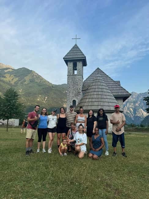 Tirana: Albanian Alps and Theth Village Day Tour - Entering Theth Village, church views, and the Reconciliation Tower