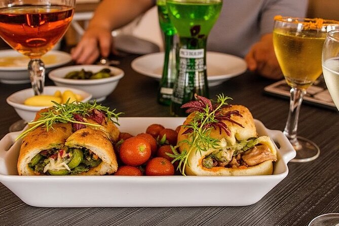 Tirana by Eden: Food & Drink Tour - What you’ll taste: byrek, tave kosi, baklava, raki, and a cocktail