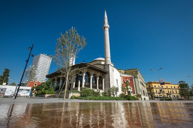Tirana City Tour with Hotel Pickup - Pazari i Ri: finish with markets, snacks, and street-level Tirana