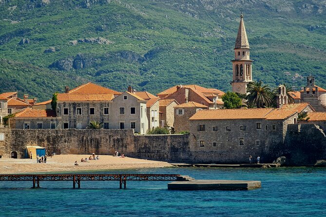 Tirana: Day Tour to Montenegro, Budva and Sveti Stefan - Budva Old Town walk: narrow stone lanes, Venetian-style streets, and real free time