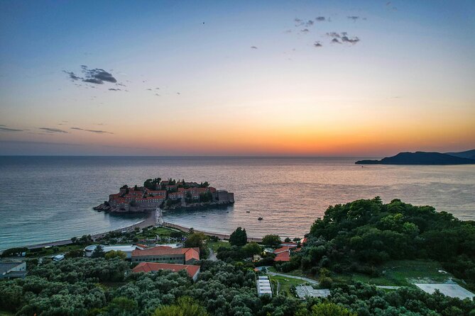 Tirana: Day Tour to Montenegro, Budva and Sveti Stefan - Budva Dancing Girl plus Mogren Beach: iconic promenade photos, then sand-and-sea time