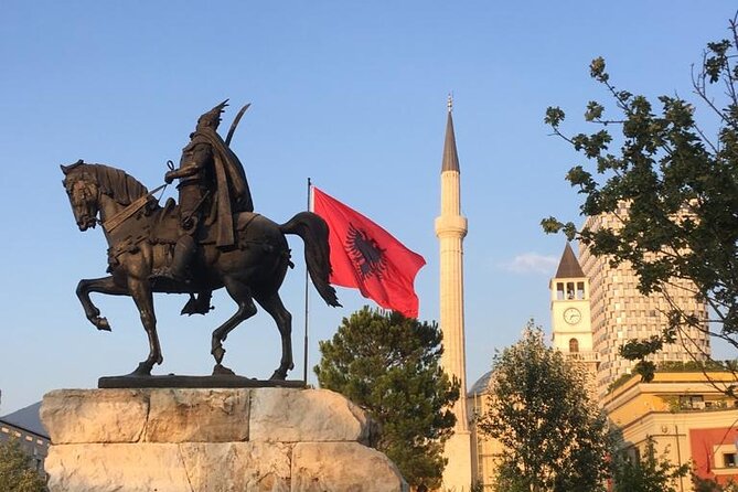 Tirana Express Walking Tour - Essential of the Albanian Capital - Komiteti Bar cafe-museum: communist objects plus a drink break