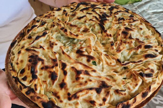 Tirana Guided Street Food Gems Tour (6 dishes, 1 sweet and drink) - Stop 3 at Sheshi Skënderbej: see Tirana’s key landmarks while you walk