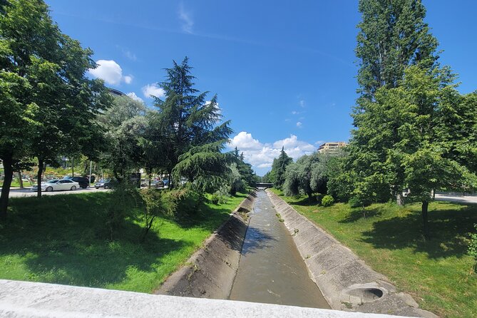 Tirana’s Communist Past: A Tasting Tour with Traditional Lunch - Postbllok checkpoint memorial: prison memory and a Berlin Wall fragment