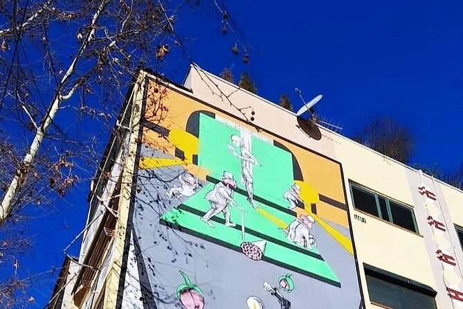 Tirana: Street Art & Modern Architecture Tour - Starting at Sheshi Skënderbej, where Tirana feels big