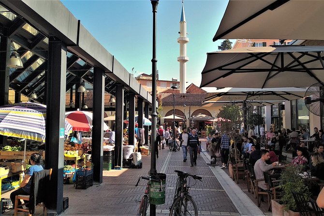 Tirana Walking Tour, Extra Virgin Olive Oil and Raki Tasting - Tirana Clock Tower and Murat Toptani, where eras overlap