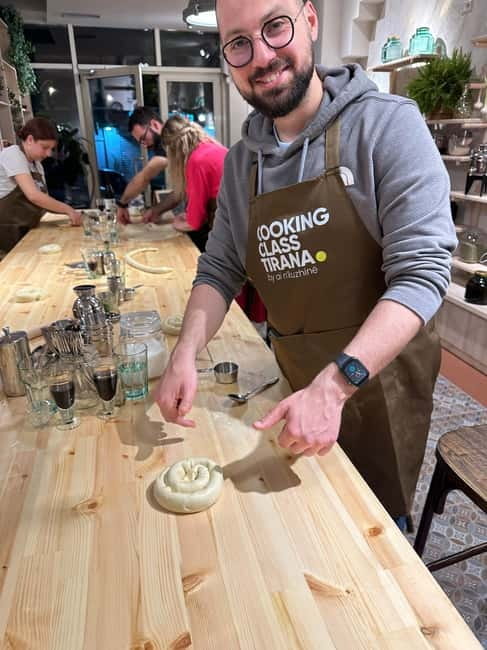 Traditional Albanian Cooking Class in Tirana & Raki Tasting - The Welcome Spread: Meze Appetizers, Bread, and Albanian Sweets