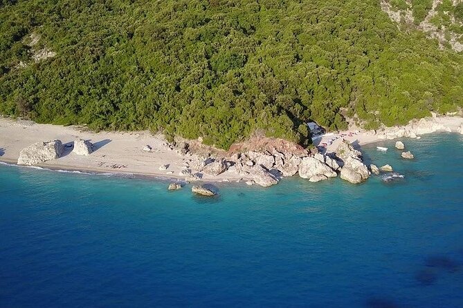 Visit Kroreza Beach by Boat - The beach itself: white pebbles, clear water, and big shoreline views