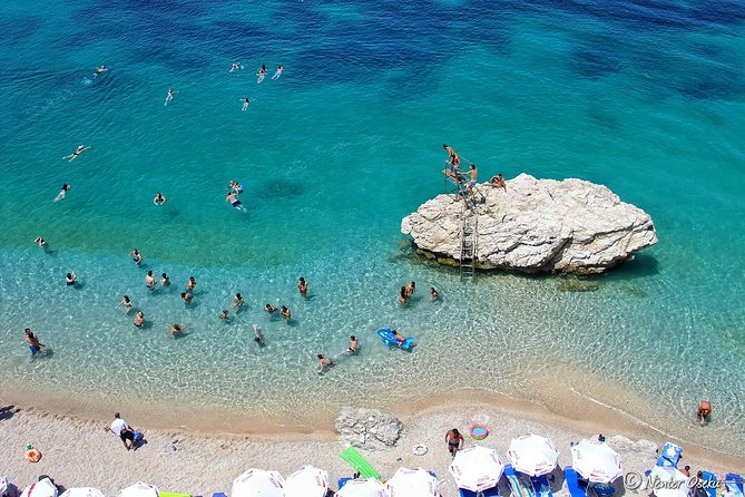 Visit Vlore & Himare Beaches includes lunch - Stop 3: Llogara Pass scenic road, quick photos, and paragliding add-ons