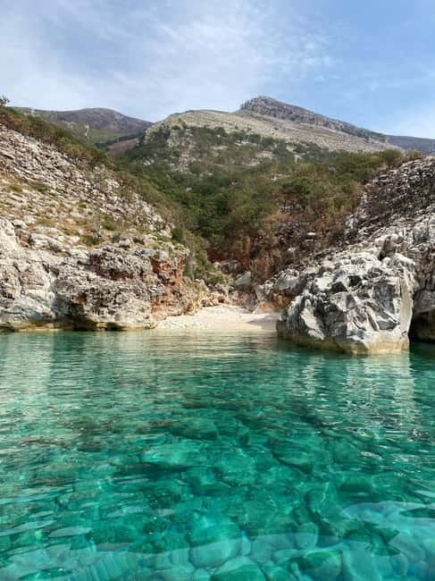 Vlore: Blue Cave & Smuggler<code>s Canyon, Karaburun Expedition – Key points to know before you go’ /></p>
<ul>
<li><strong>Blue Cave plus multiple cave-to-bay stops</strong> means you get several different swim scenes, not just one</li>
<li><strong>Haxhi Ali Cave</strong> includes a guided visit plus time to swim and snorkel</li>
<li><strong>Kanioni i Skafistave</strong> is the canyon-style stop that fits the Smuggler’s Canyon theme</li>
<li><strong>Grama Bay gets the longest stretch of free time</strong>, including a walk and self-guided exploring</li>
<li><strong>Transport gets top marks</strong>, with 100% of reviewers giving a perfect score for the boat transfer</li>
<li><strong>Pack light</strong> since luggage or large bags are not allowed on board</li>
</ul>
<h2>From Vlora Promenade to the Karaburun Peninsula in One Long Day</h2>
<p><img width="520" height="650" decoding="async" src=
