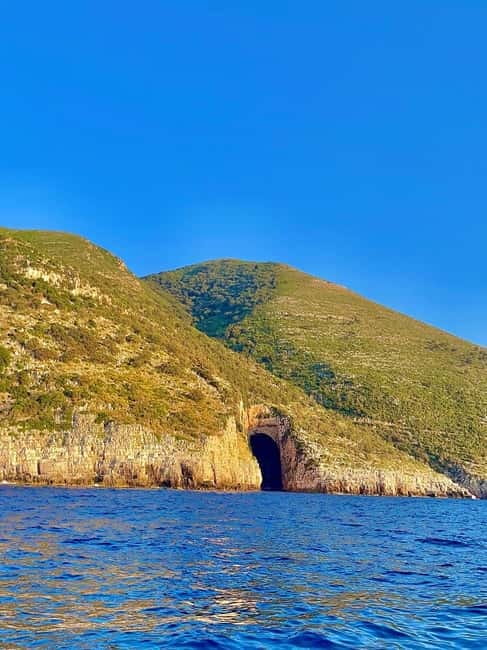 Vlore: Grama Bay & Karaburun Caves 8-Hour Speedboat Tour - Englishman Bay: hidden coastline plus a guided history moment