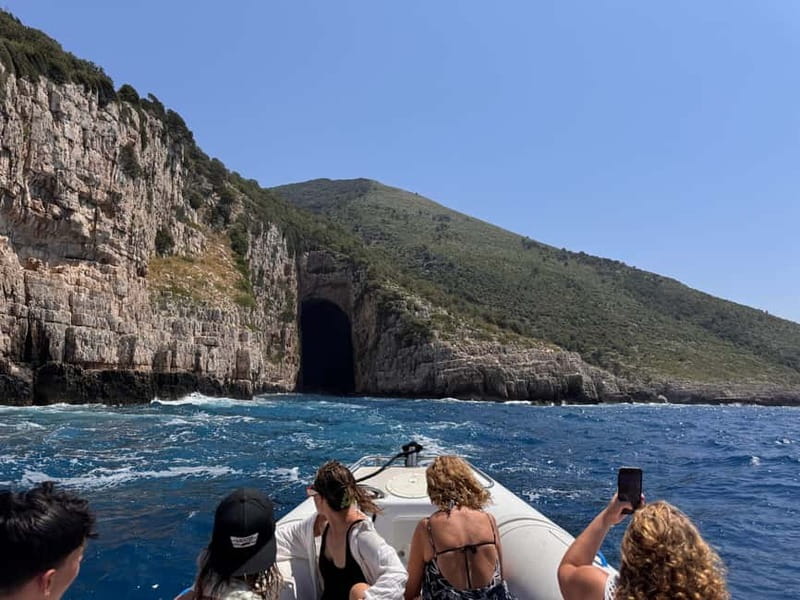 Vlore: Sazan Island, Haxhi Ali Cave & Karaburun by Speedboat - Dhimkusht Beach: restaurant time, sunbeds, and a choose-your-own-adventure feel