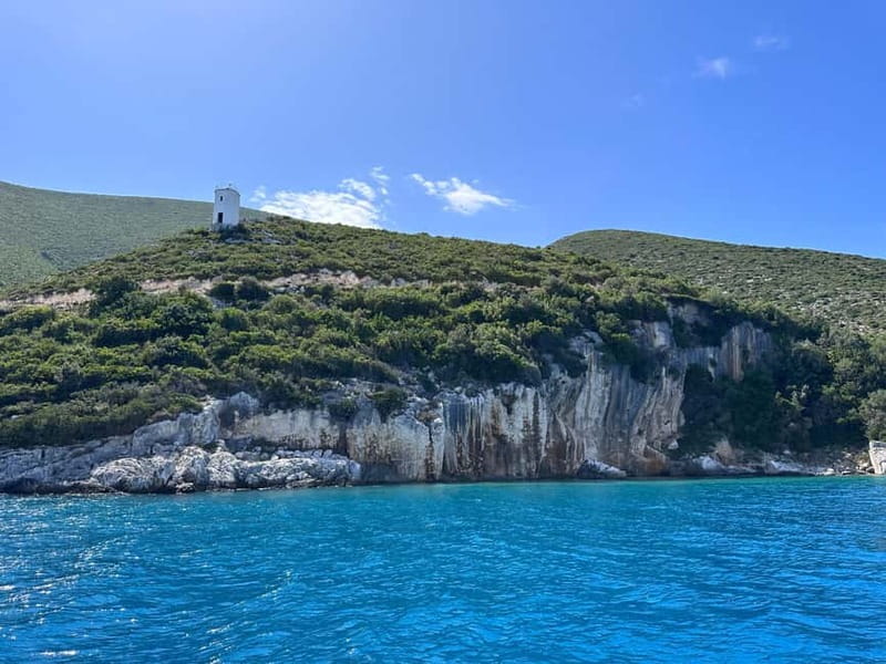 Vlore: Sazan Island & Haxhi Ali Cave Speedboat Guided Tour - Haxhi Ali Cave by boat: the lighting effect is the whole point
