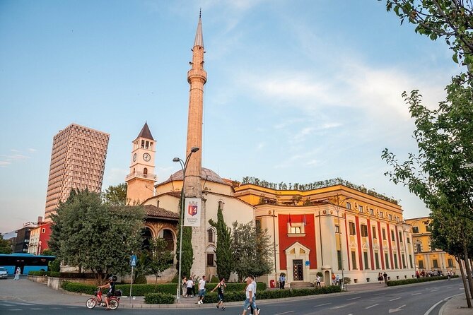 Walking tour of Tirana; History & Culture - Skanderbeg Square: Where National Pride Meets Daily Life